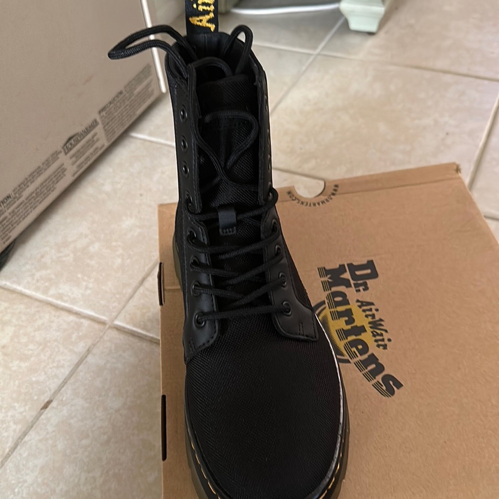 Brand new Dr. Martens boots with box. Size 9 women’s Size 8 mens